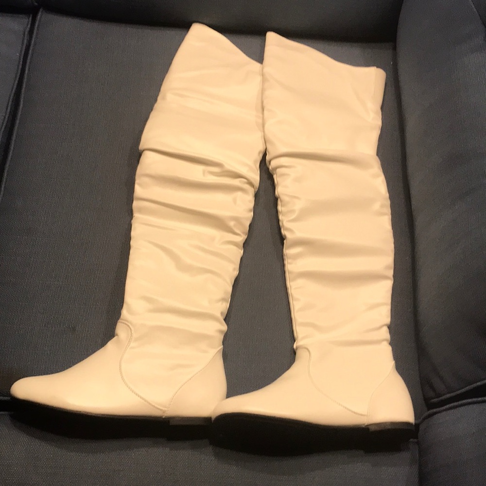 White knee high boots